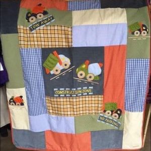 SOLD! OshKosh construction crib bedding